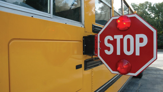 Abu Dhabi Police Warns Motorists against Ignoring the Stop Signs of School Buses